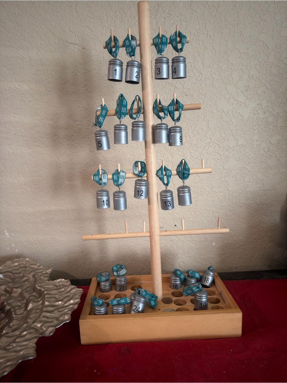 Wooden Advent Countdown Stand with Silver Numbered Tins and Teal Tags